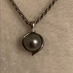 Hawaiian black pear necklace with small diamond
